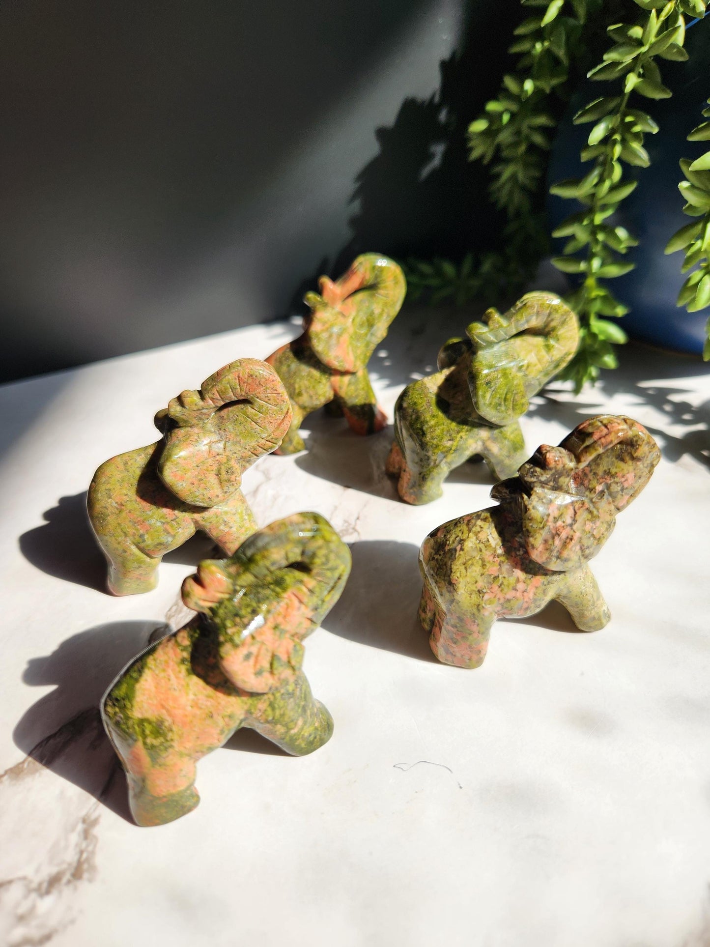 Beautiful hand carved unakite elephants, natural unakite
