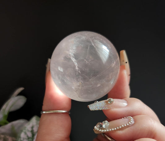 High quality 6 star rose quartz sphere with rainbows and asterism from Mozambique  G29 R7