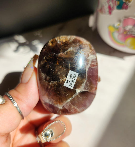 Rare natural super seven palm stone  from Brazil  25E