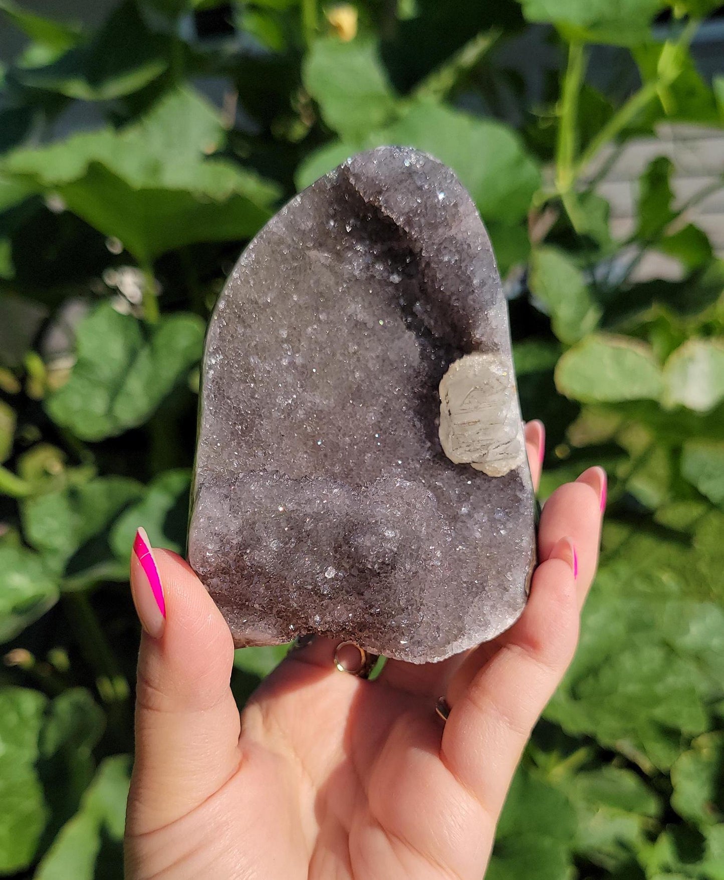 Lavender gray rainbow amethyst cutbase with calcite from Uruguay, natural color