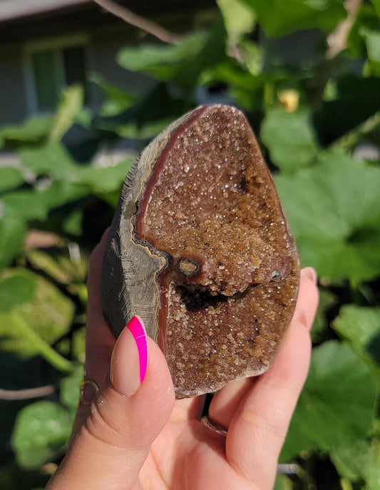 Beautiful brown rainbow amethyst cutbase from Uruguay, natural color
